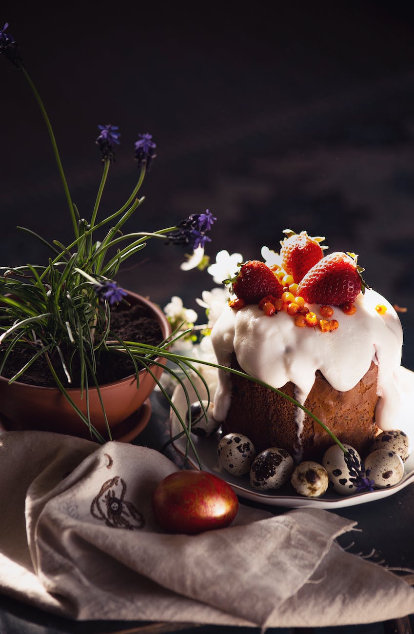 kulich easter cake and quail eggs on the plate